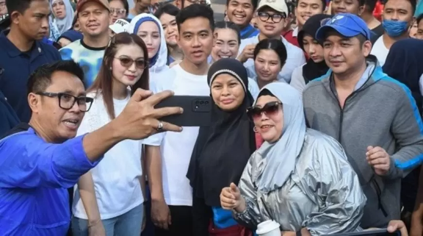 Gibran Rakabuming dan Selvi Ananda Ajak Warga Poris Gaga Cegah Stunting dengan Bagikan Susu