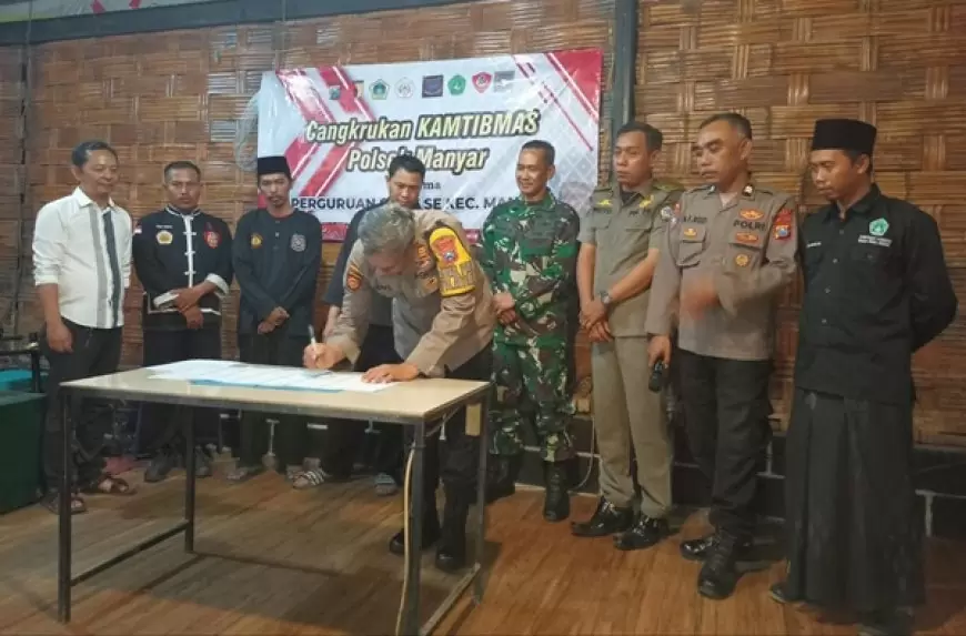 Cangkrukan Kamtibmas Cara Polsek Manyar Jalin Kemitraan dengan Perguruan Silat