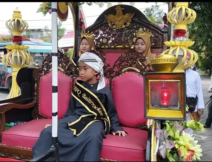 Cetak Generasi Qur’ani, TPQ Baitturrochim Gresik Wisuda Santri ke-7 dengan Pawai Meriah